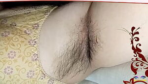 beautiful lady laying on bed in red penty with beautiful natural big tits